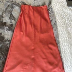 Salmon colored silky ankle length skirt